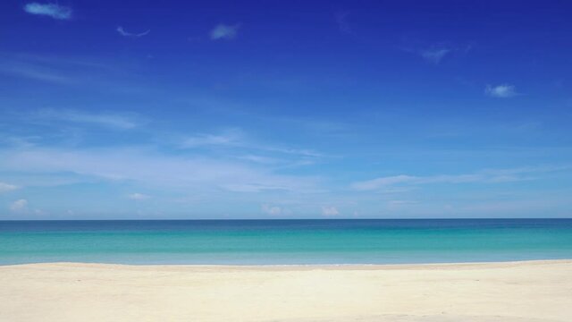 Phuket beach sea sand and sky. Professional video Landscape view of beach sea in summer day. Beach space area. At Karon Beach, Phuket, Thailand. On 01 May 2021. 4K UHD. Video Clip