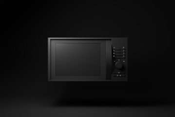 Black Microwave Oven floating on black background. minimal concept idea. monochrome. 3d render.