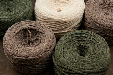 green gray and white cotton threads for macrame, hobby, weaving from threads