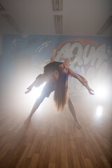 Group of multiracial dancers are exercising and practicing in their studio in slow motion