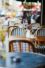Obraz na płótnie Canvas Table of traditional Parisian outdoor cafe