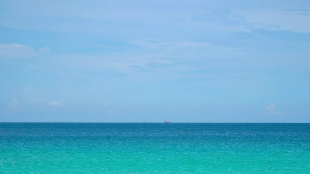 Phuket beach sea sand and sky. Professional video Landscape view of beach sea in summer day. Beach space area. At Karon Beach, Phuket, Thailand. On 01 May 2021. 4K UHD. Video Clip