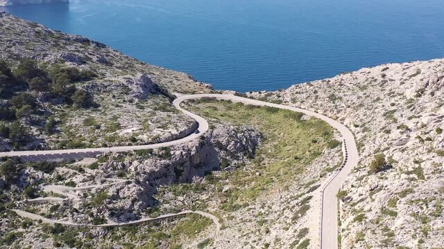 Massive cliff Formentor Road, aerial vision drone flight over tramuntana mountains