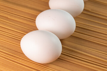 White eggs on the raw pasta