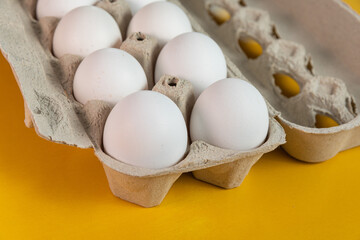 Eggs on the yellow background