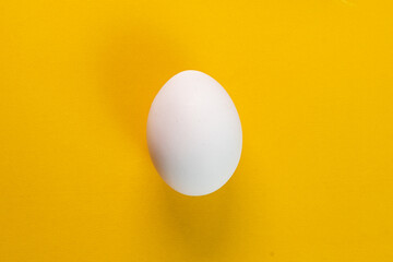 Egg on the yellow background