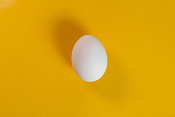Egg on the yellow background