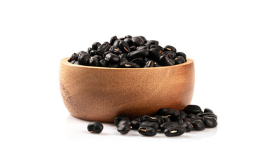 Black gram (Vigna mungo ) in wooden bowl  isolated on white background.
