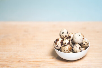 bowl of quail eggs with empty space for type