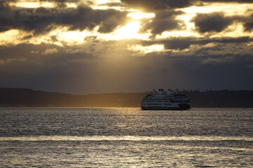 Fototapeta na wymiar ferry in golden sunlight 
