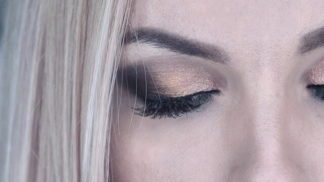 Beauty eyes makeup. Color eyeshadow on eye. Beauty makeup cosmetics.
