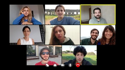 connection, internet - young man laughs and jokes with friends on video call 