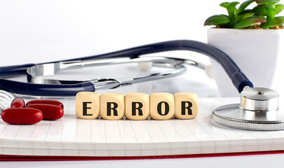 ERROR word made with building blocks, medical concept background.