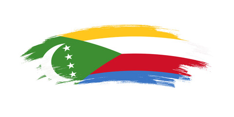 Artistic grunge brush flag of Comoros isolated on white background