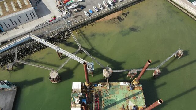 Sea Jack Thanet Offshore Wind Project platform in Ramsgate Harbour Kent UK overhead drone footage .