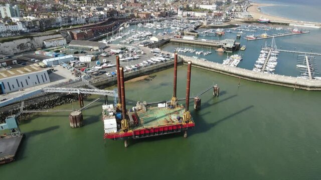 Sea Jack  Thanet Offshore Wind Project platform in Ramsgate Harbour rising drone footage 4K.