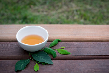 Bird eye view of tradition nature green tea, drink and food concept, copy space for individual text and design, wooden table background