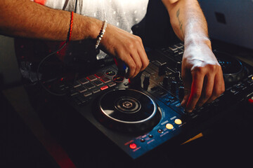 Closeup portrait of confident DJ with headphones
