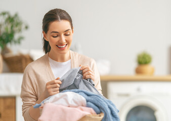 woman is doing laundry