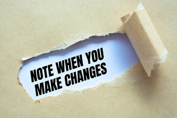 NOTE WHEN YOU MAKE CHANGES message written under torn paper.