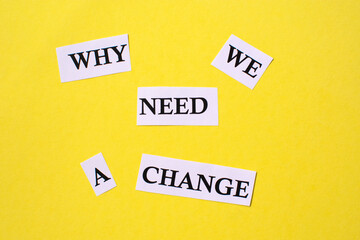 Text why we need a change on a yellow background. The concept of development and growth