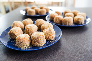 vegan arancini risotto balls with tomato sauce filling, healthy plant-based food