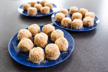 vegan arancini risotto balls with tomato sauce filling, healthy plant-based food