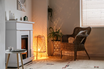 Stylish interior of living room with fireplace