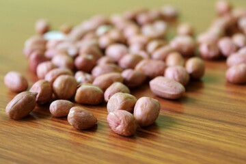 groundnuts on wooden table