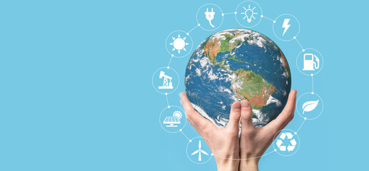 3D Earth planet globe in man, woman hand, hands on blue background. Environmental protection concept. Elements of this image furnished by NASA