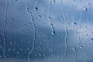 rainy days, rain drops on the window surface 