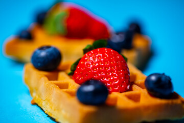 Fototapeta na wymiar strawberry and waffle.summer food background