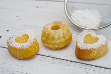 delicious mini cakes with powdered sugar