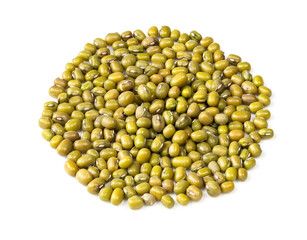 handful of green mung bean closeup on white