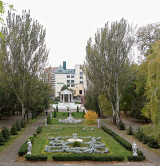   Flower beds with sculptures in Gorky Park in autumn