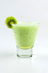 Isolated glass of fresh kiwi smoothie on the white background