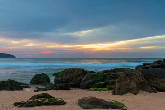 Soft high cloud sunrise seascape