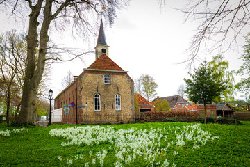 Ancient little reformed church in picturesque village Oudeschans Westerwolde in Groningen, The...