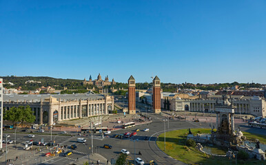 Cityscape view of Venetian towers and National Palace of Montjuic, Plaça Espanya, Barcelona, Spain