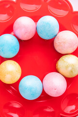 Painted eggs for the holiday of bright Easter lie in a circle.