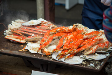Tokyo, Japan Street in Tsukiji outer market in Ginza with closeup retail sample display of cooked...