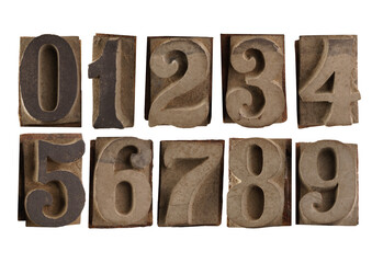 Print numbers set in blocks of wood and rubber. White background