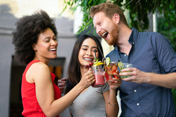 Group of friends having fun together. People talking laughing and enjoying their time