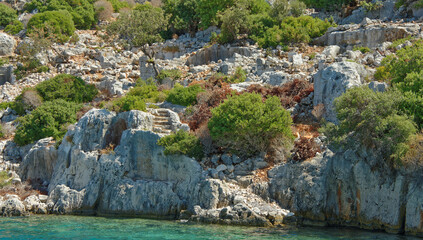 Fototapeta na wymiar Kekova is an island keeps under water the ruins of 4 ancient cities, that fell into the water in the II century BC as a result of an earthquake