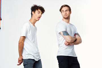 emotional men in white t-shirts antics fun isolated background