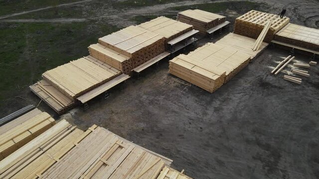 aerial filming along warehouses with prepared boards for sale