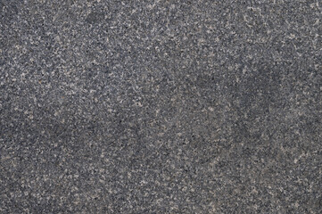 Abstract background of grey tiled walkway in a park
