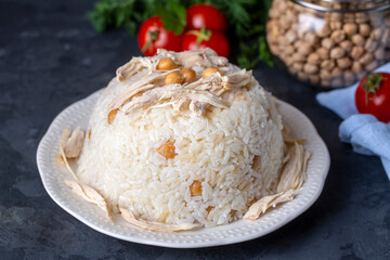 Traditional delicious Turkish food; Rice with chickpeas and chicken (Turkish name; Tavuklu nohutlu pilav or pilaf)