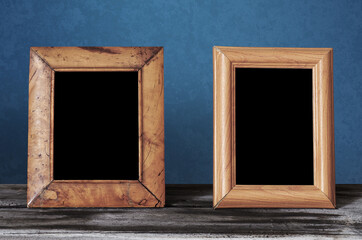 frames on table, blue wall