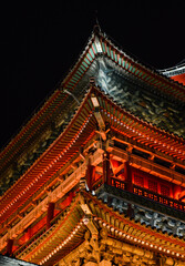 Fototapeta na wymiar Xian Drum Tower building section facade illuminated by Night